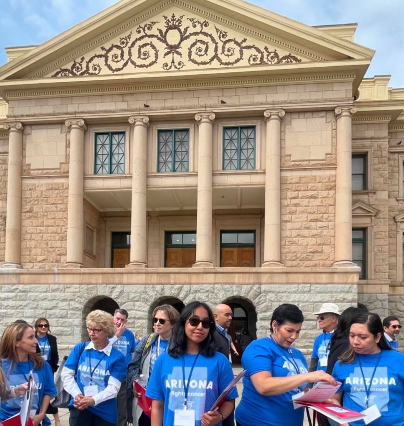ACS CAN volunteers in Arizona Fights Cancer shirts outside the Arizona State Capitol